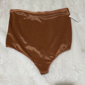 SKIMS 4X High-Waisted Satin Thong Panties in Rust